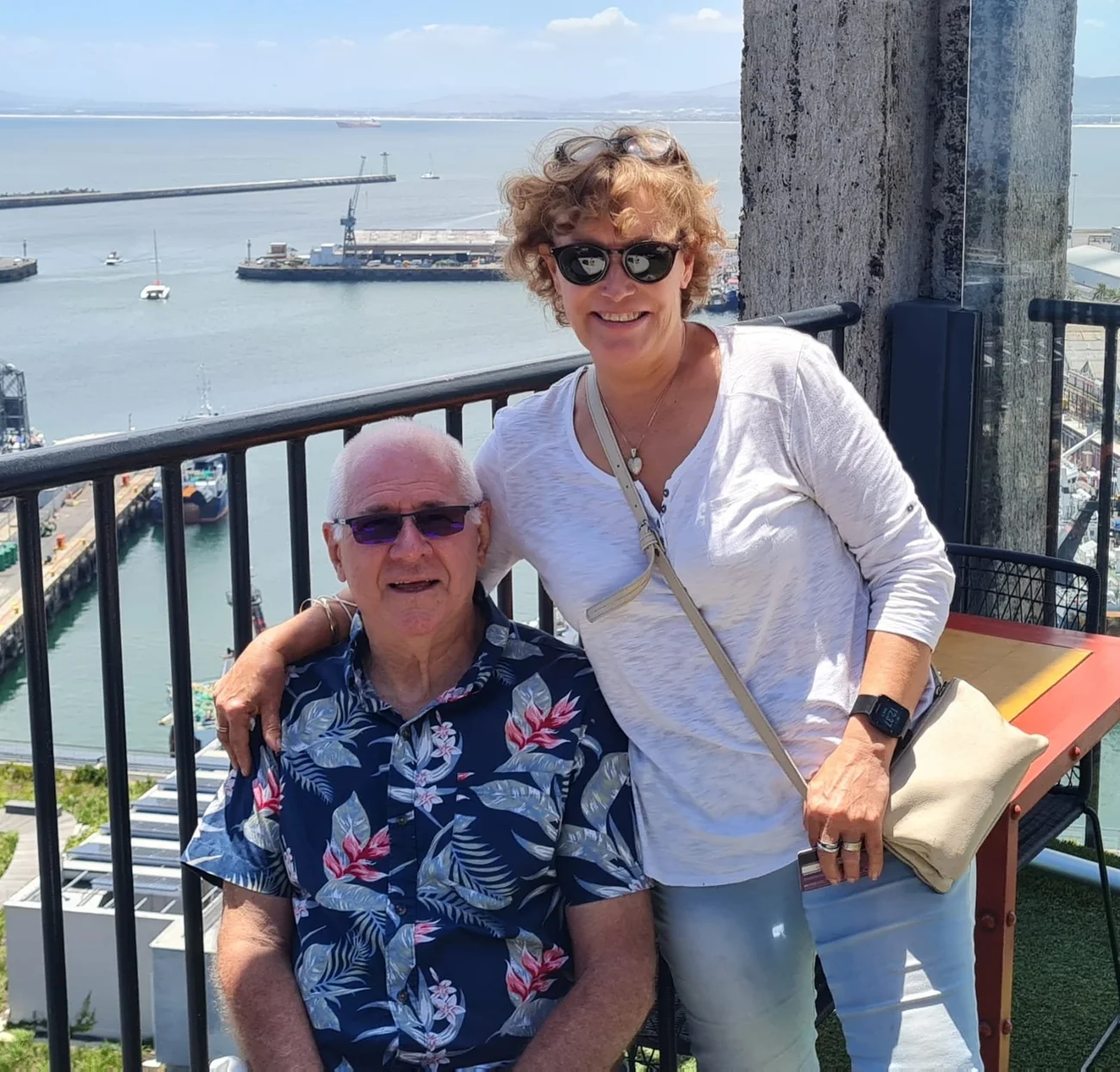 Dieter Harck and Lynne Grubb together overlooking Cape Town harbour.